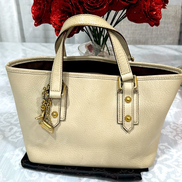 Gucci Handbags - 6hr OS Gucci mini Tote bag in good condition